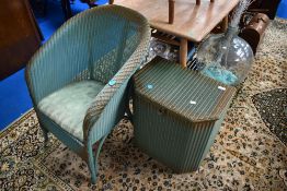 A vintage Lloyd Loom tub chair and linen basket