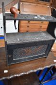 A Victorian carved smokers stand and early 20th Century mahogany cased wall clock