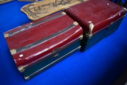 Two painted tin travel trunks