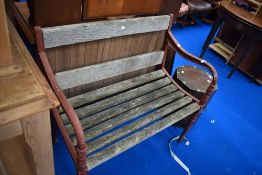 A garden bench having cast ends