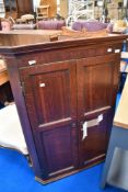 A George III oak wall corner cupboard