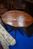 An Indonesian hardwood pedestal table