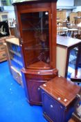A reproduction Regency style corner display, hifi cabinet and glass topped coffee table