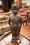 A vintage metal companion stand (no tools) modelled as Dutch boy, height approx. 47cm