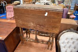 A Victorian mahogany occasional table having turned frame