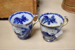 Two 19th century blue and white transfer pattern tea cups, having gilt heightening, AF.