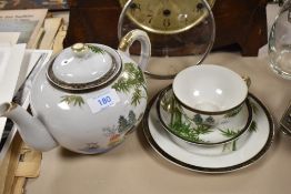 A Japanese HSC Fuji China teapot and trio, having lithophane to cup and traditional lake scene