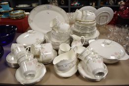 A quantity of Royal Doulton 'Twilight Rose' pattern tea and dinner wares, to include tureens,