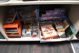 A selection of die cast classic trucks, games , marbles and dice etc.