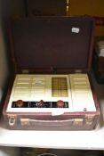 A vintage 1950s portable Vidor radio in case, serial number 8476.