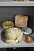 Five stone ashtrays of different forms, to include a circular onyx ashtray