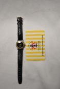 A Giorgio Beverly Hills timpiece with international warranty card