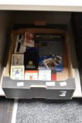 A selection of collectable packs of playing cards, including Woodbine, Capstan and players, also