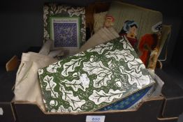 A quantity of embroidered/needlework samplers, table cloth, sampler kits