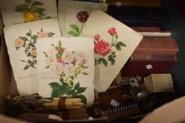 An assorted selection of items including floral wall plaques, a small selection of books including