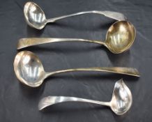 A pair of George III silver sauce ladles, Old English pattern with engraved initial H and arm and