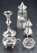 A George V silver topped cut-glass sugar caster, marks for Birmingham 1932, maker W I Broadway & Co,