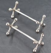 A pair Edwardian silver knife rests, of traditional design, marks for Birmingham 1903, maker