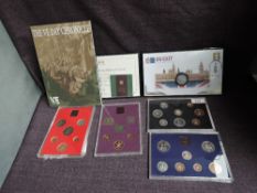 Four GB Coin Year Sets, 1980, 1981, 1982 and 1983 with certificates along with a 2020 Brexit