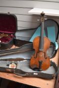 A 19th Century violin having two piece 14inch back, interior paper label, Francesco Ruggeri, sold