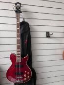 A Washburn WB 66 bass guitar and gig bag