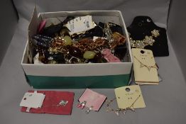 A good selection of mixed modern costume jewellery, many items new with tags, including necklaces,