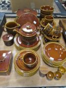 A collection of Hornsea pottery 'Heirloom' in brown colour way, teapot, butter dish, jug, plates,