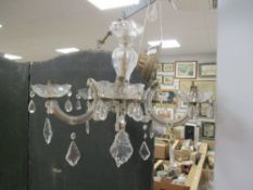 A vintage five branch electrolier with cut glass lustre drops.