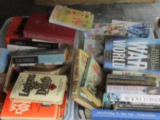 Two boxes of books, of mixed war related interest.