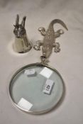 An English pewter cup, having hare head with antlers, sold with a magnifying glass with alligator