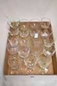 Nineteen vintage and antique wine glasses, including cut glass examples and Victorian glasses with