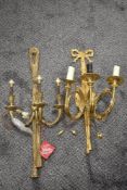 Two modern three branch heavy cast brass wall light fixtures.