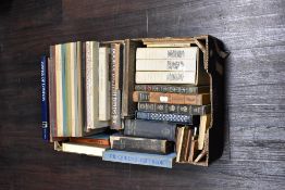 A carton of assorted books including three Folio Society editions, Lives of the Most Notorious