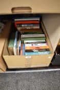 A carton of mainly easy reading books including The Hunger Games 1-3, The Steel Bonnets and Arthur C
