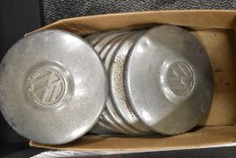 A collection of various Volkswagen hub caps.