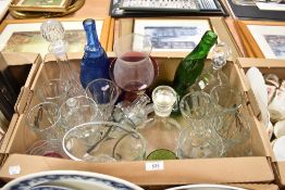 Three assorted glass decanters, six tall sundae glasses and four stylised highball glasses etc.