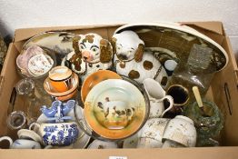 Two staffordshire dog statues, a child's cup and saucer set having chicken decoration, an Australian