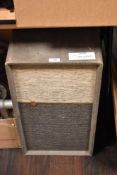 A vintage loudspeaker, labelled Ear.