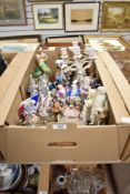 A collection of figurine and animal studies.
