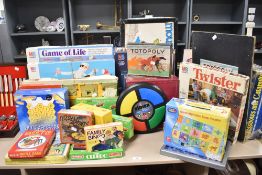An assorted collection of children's vintage board games, to include MB Games, a Waddington's Travel