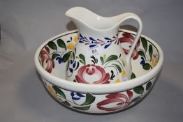 A modern Portmeirion 'Welsh dresser' wash jug and bowl.