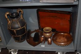 Three antique German porcelain cherub design pieces including table centre, spoon warmer and a vase