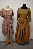 A 1940s gold/green iridescent evening gown with square neckline, 3/4 sleeves, full gathered skirt