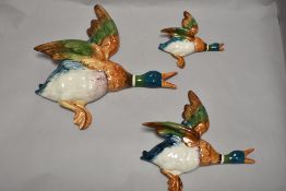 Three Beswick Pottery mallard wall plaques, 596/0 (AF) 596/2 and 596/H (AF).