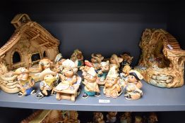A selection of hand-painted stonecraft Pendelfin rabbit figures, of typical anthropomorphic