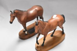 A Beswick large thoroughbred 1772 and a Royal Doulton Red Rum style Two A226 marked as second.