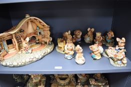 A selection of hand-painted stonecraft Pendelfin rabbit figures, of typical anthropomorphic
