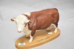 A Connoisseur Beswick Pottery palled Hereford Bull on plinth A2 574, in matte finish.