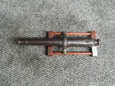 A scarce Georgian Signal Cannon on wooden display stand, reputed to have come from Whitehaven
