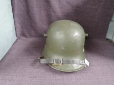 A WWI period possibly Finnish Steel, possible M17 Austro-Hungarian, having leather liner and chin